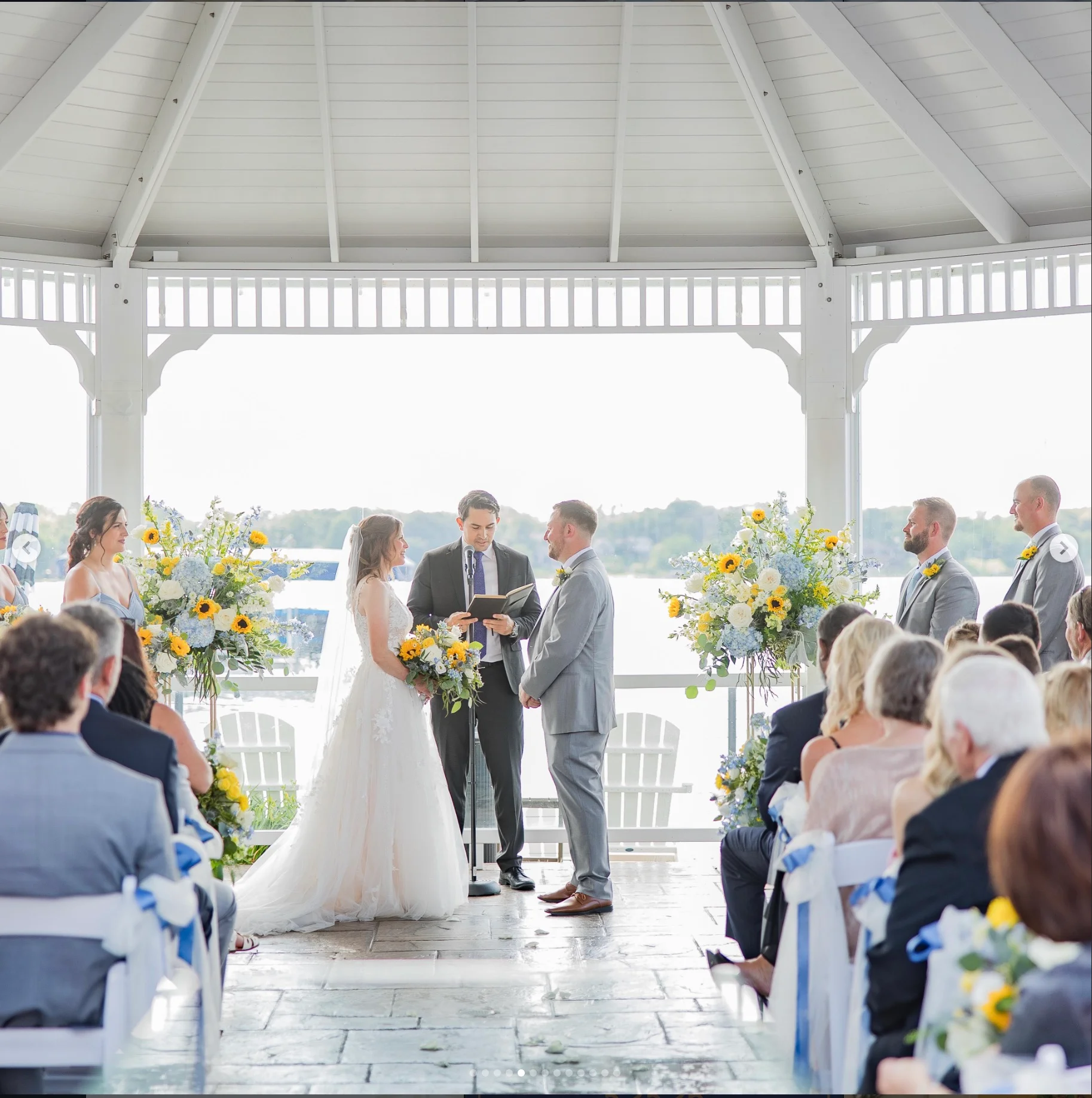 Outdoor wedding ceremony with floral arrangements