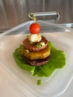 Hawaiian loco moco stacked with savory layers