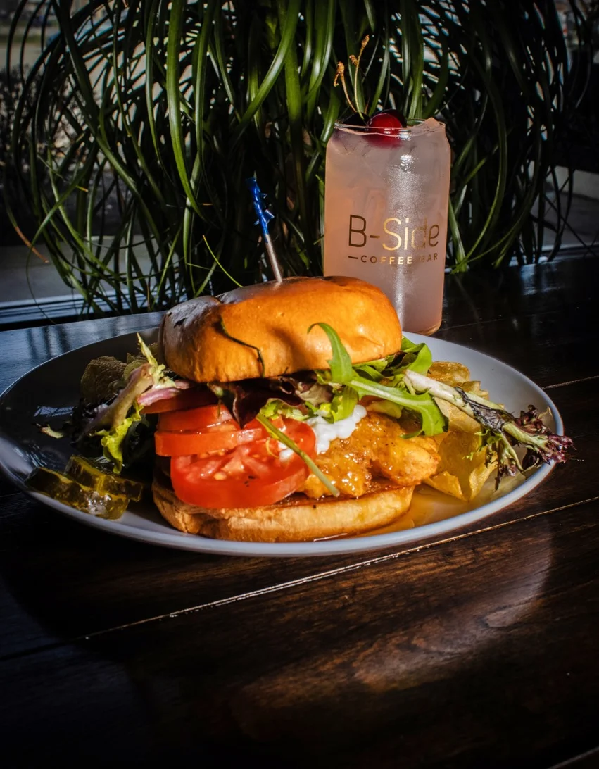 B-Side Coffee Bar’s Crispy Chicken Sandwich with crispy chicken, fresh lettuce, tomato, and mayo on a toasted brioche bun in Huber Heights, Ohio.