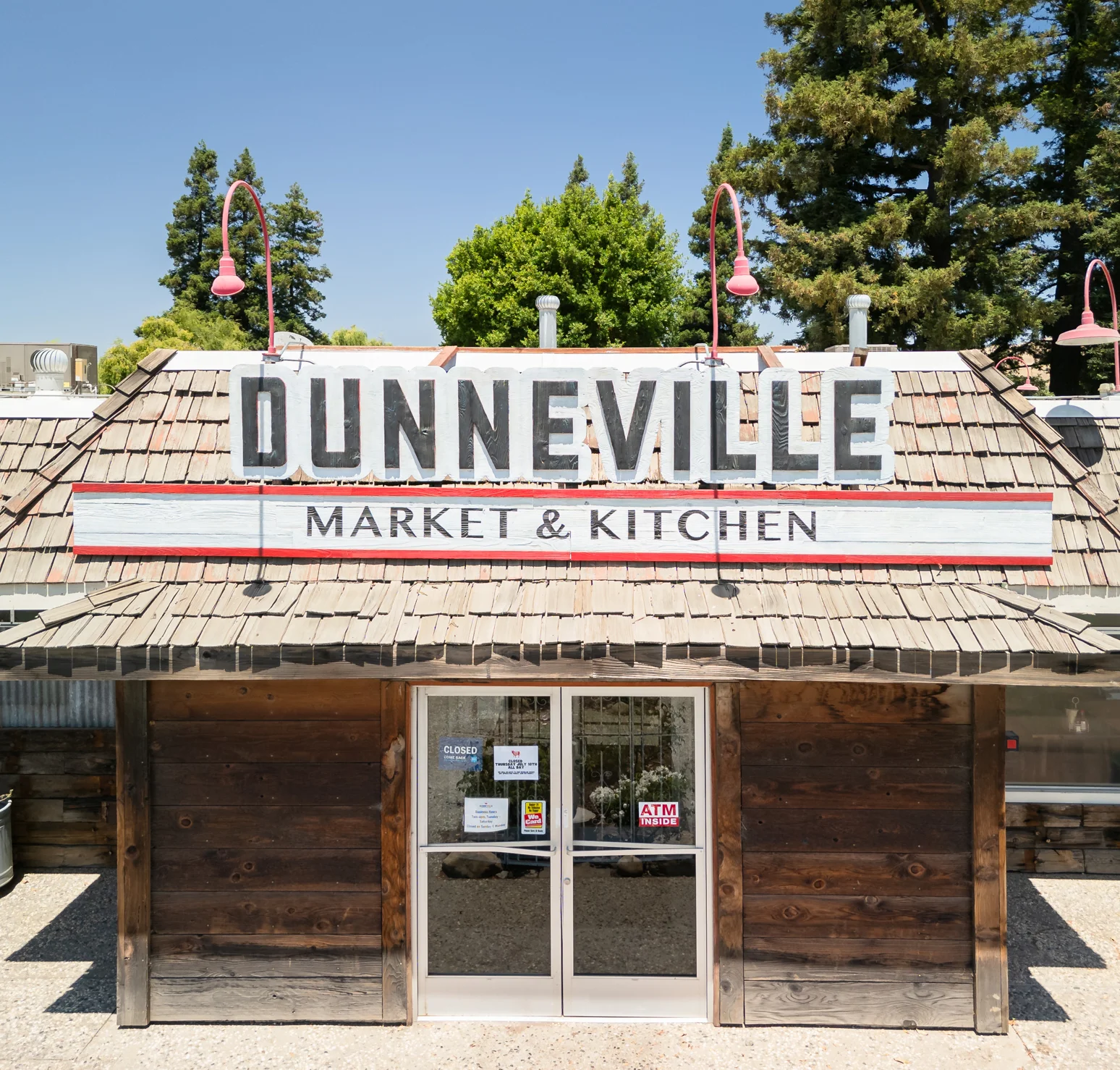 Exterior view of Dunneville Market & Kitchen with rustic wooden design
