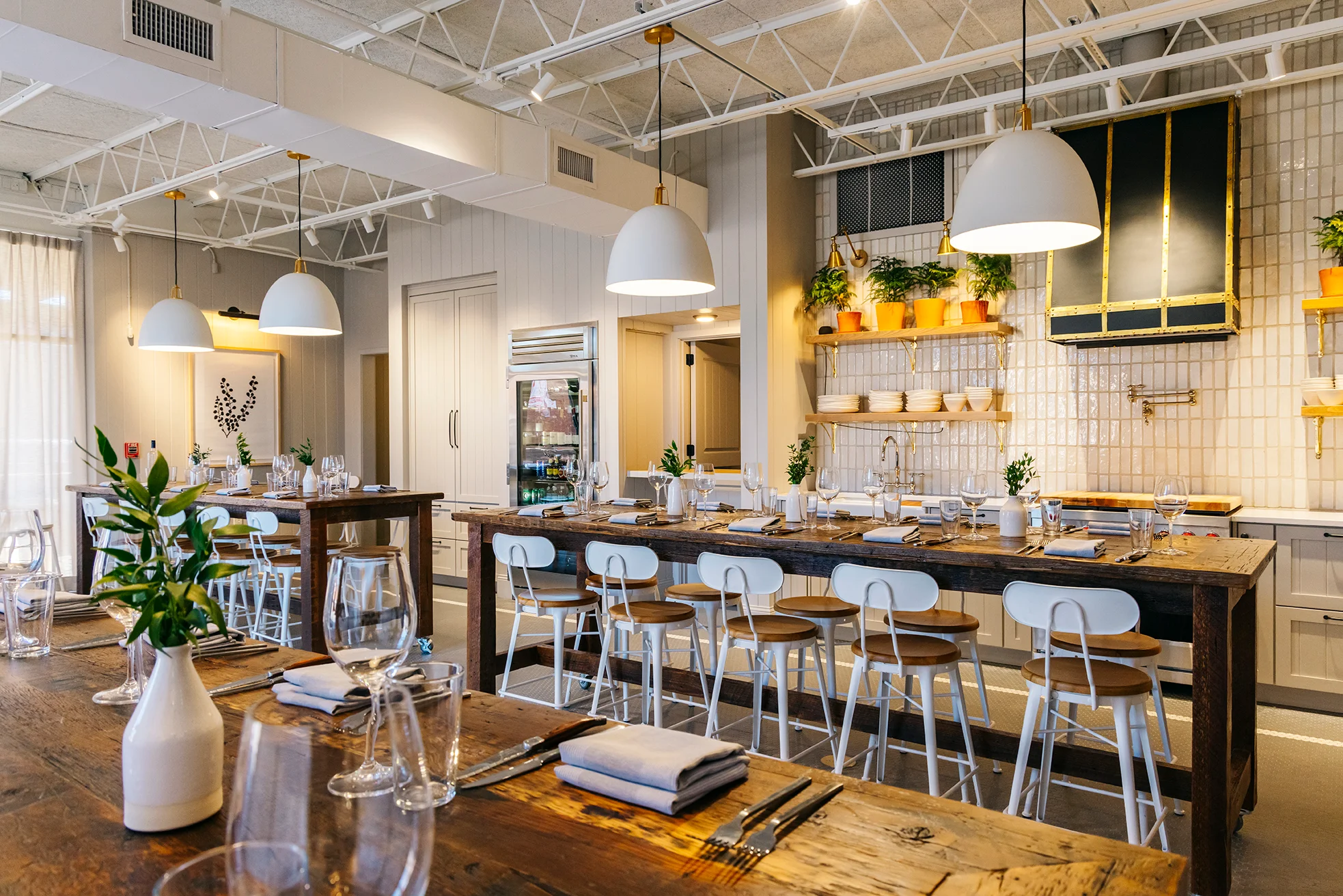 Modern restaurant interior with wooden tables and bright decor