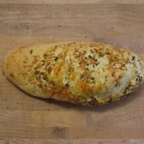 Freshly baked Italian focaccia bread with herbs