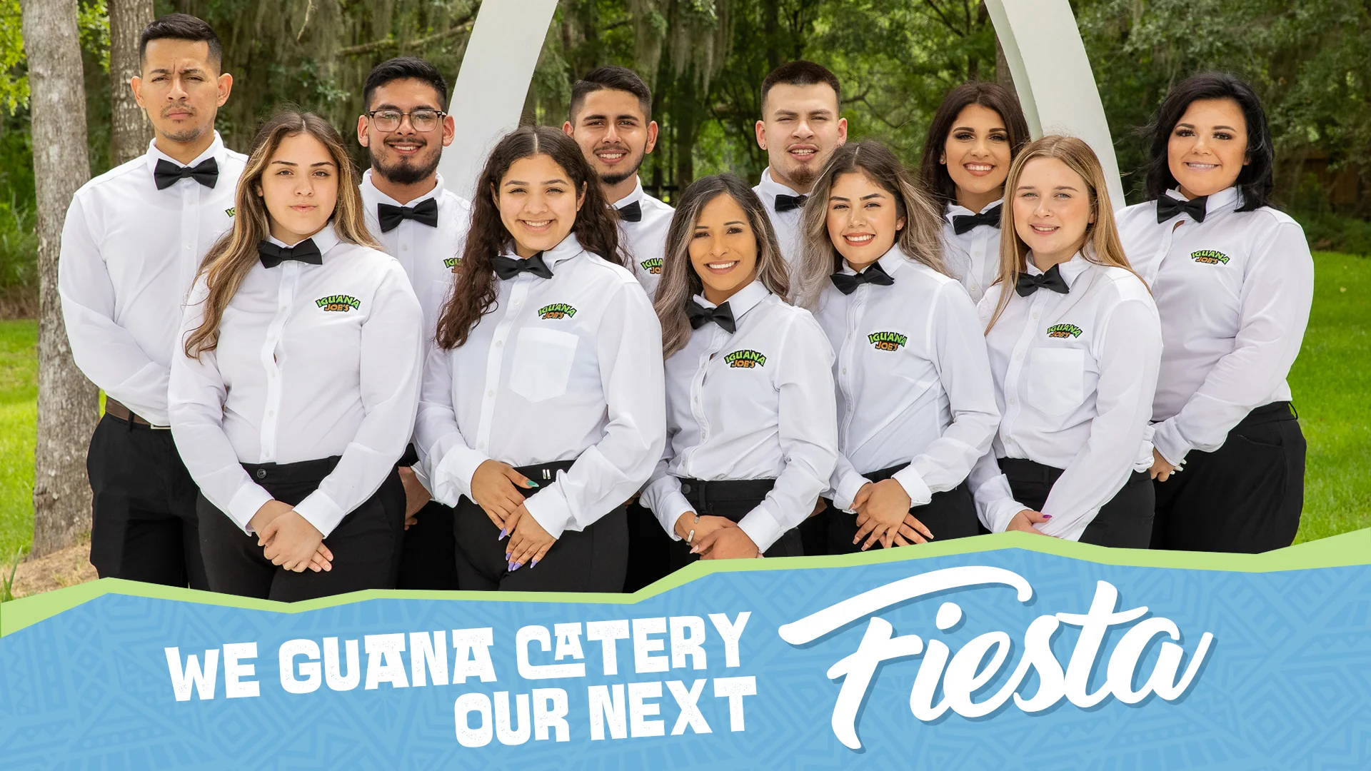 Staff members of Iguana Catery posing for a team photo