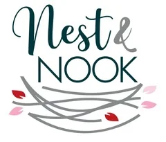 Logo of Nest & Nook, a cozy dining establishment