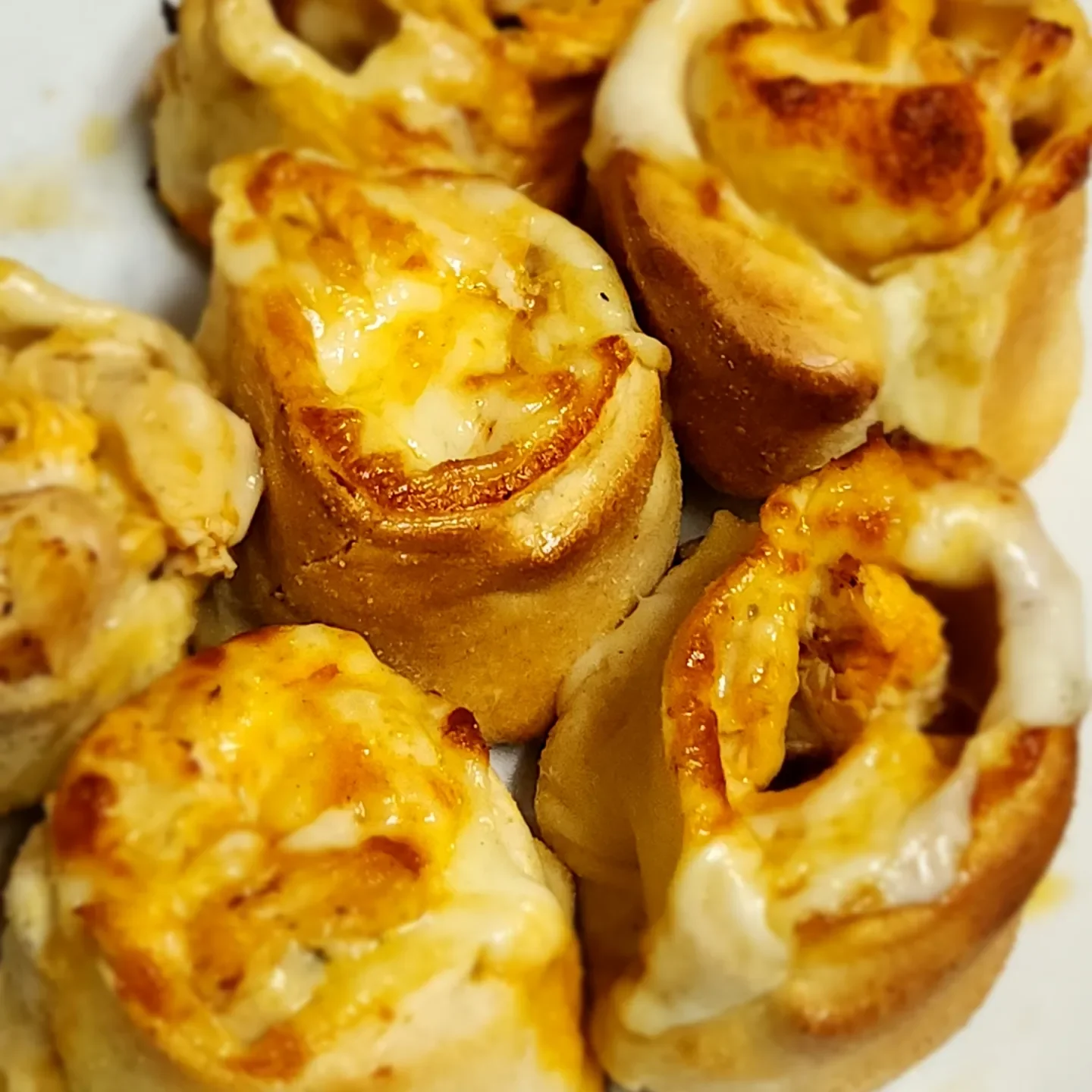 Cheesy chicken rolls baked to golden perfection