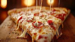 Cheesy pepperoni pizza slice with gooey melted cheese