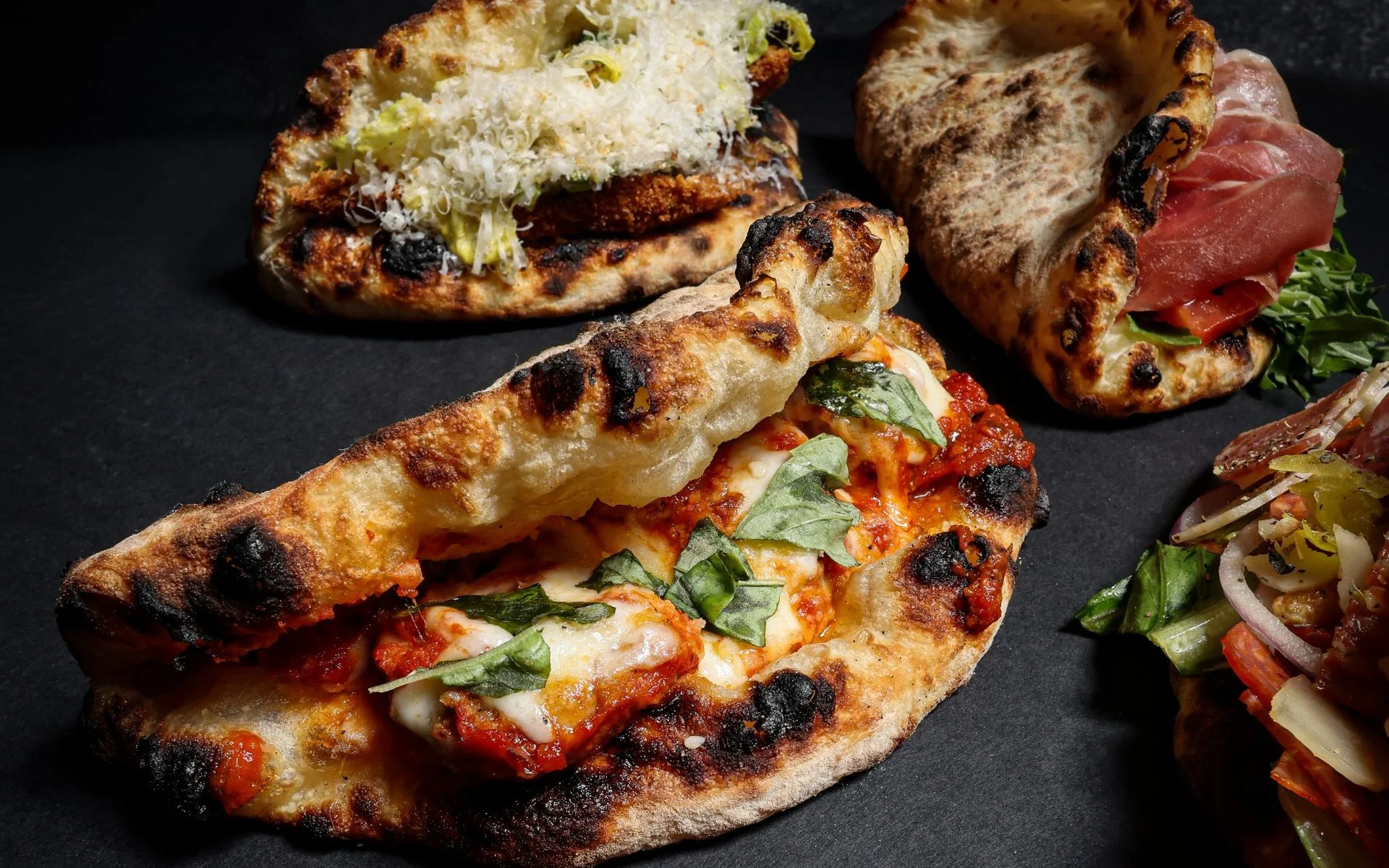 Wood-fired Italian focaccia with toppings