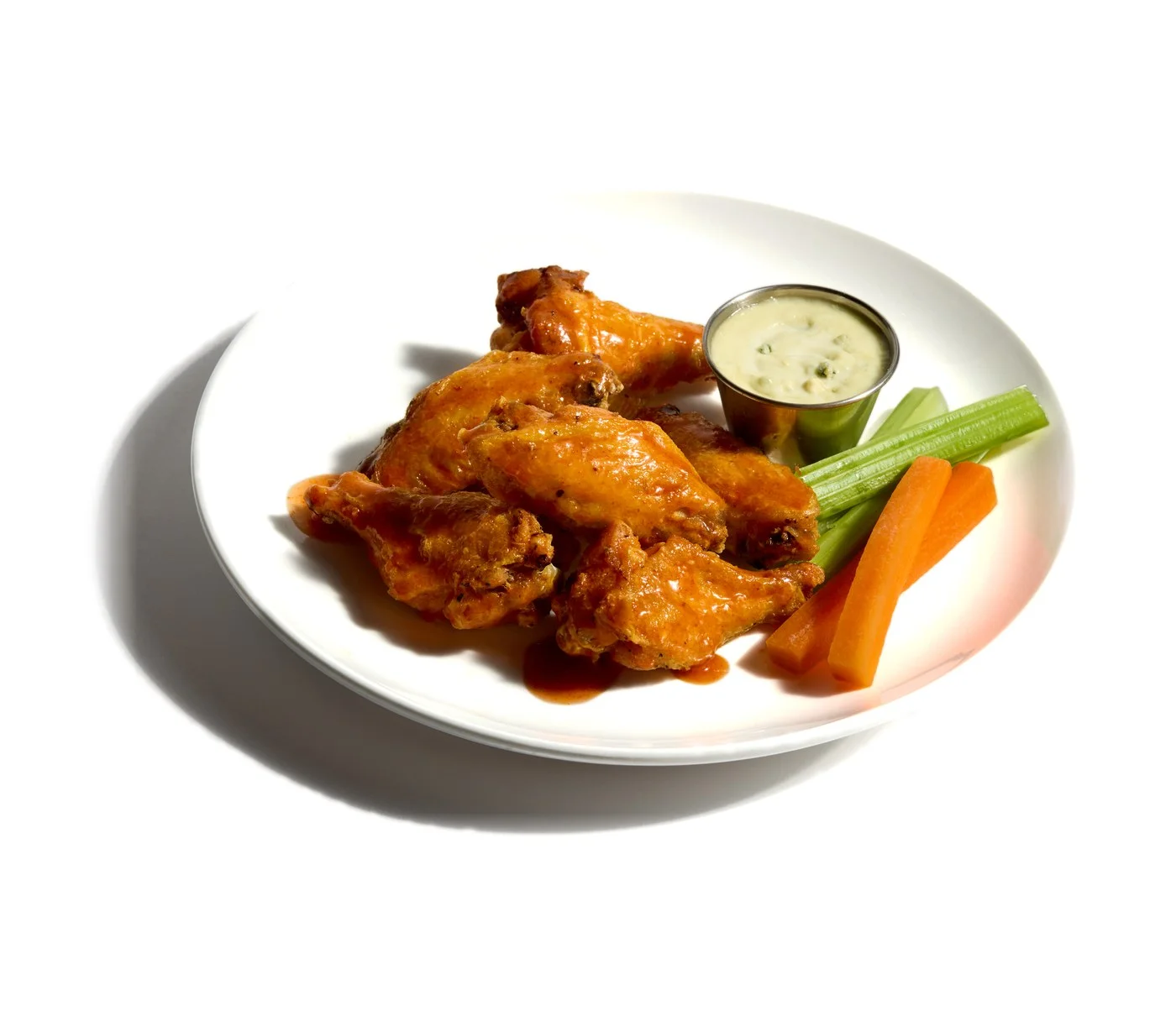 Buffalo wings with blue cheese dip, celery and carrots