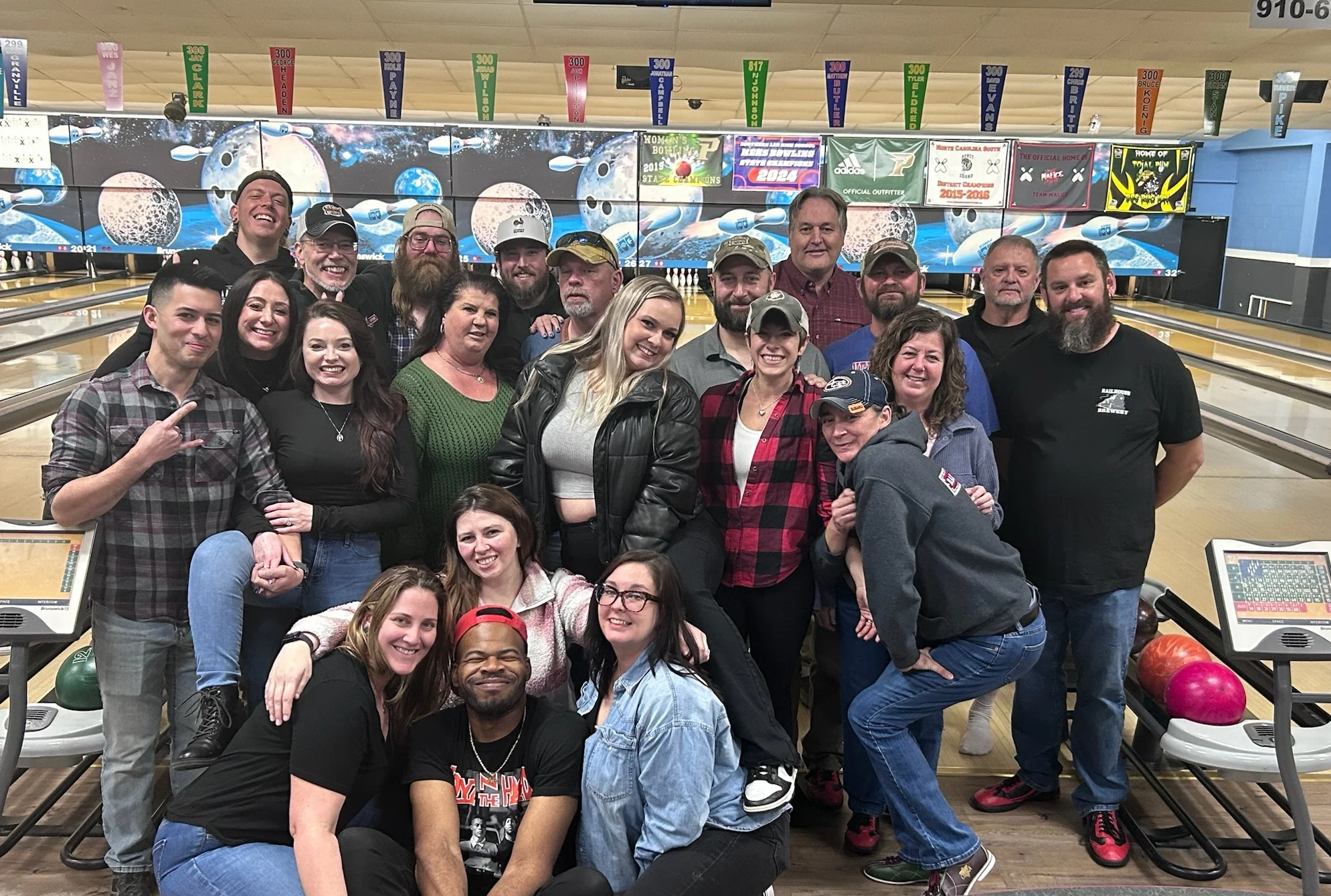 Group of friends enjoying a fun bowling night together