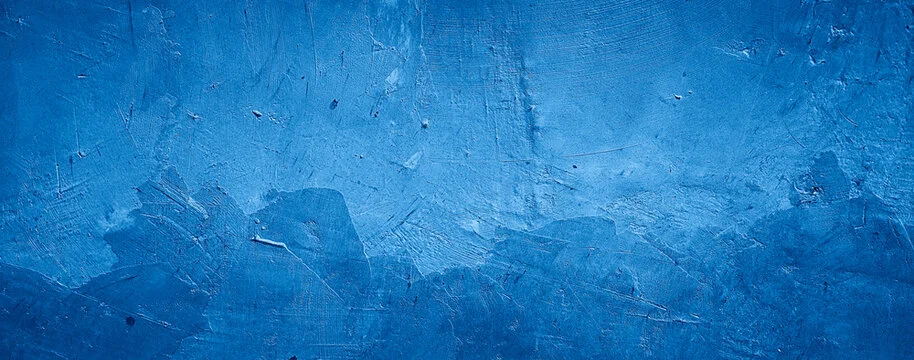 Textured blue wall background with a modern aesthetic
