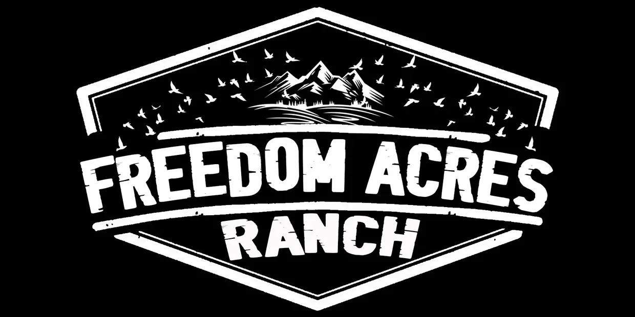 Logo of Freedom Acres Ranch with mountain and bird motifs