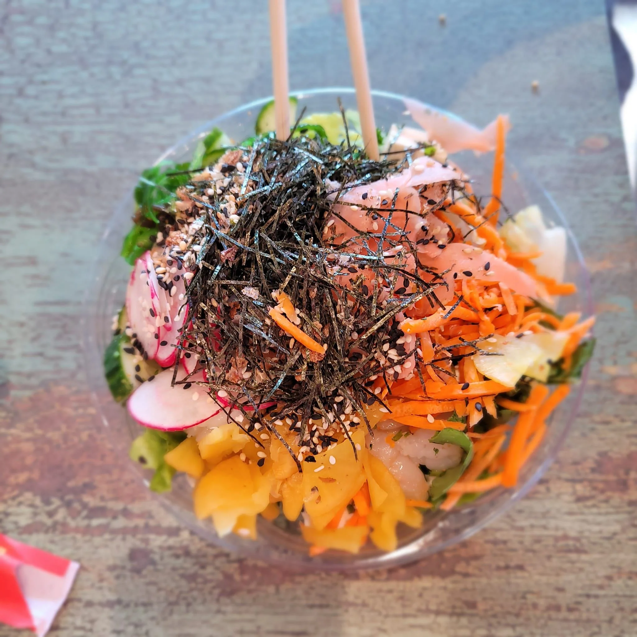 Colorful Japanese chirashi salad with seaweed and sesame