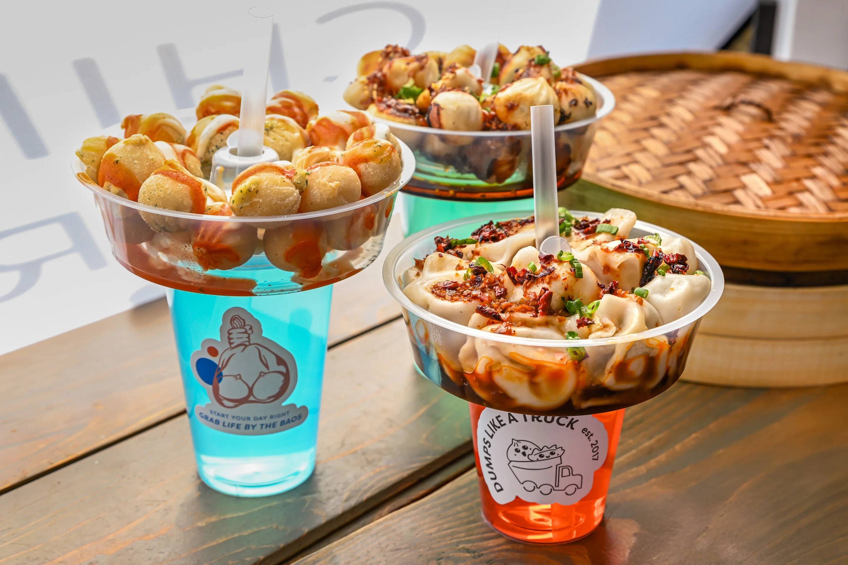 Delicious Chinese dumplings served in colorful cups