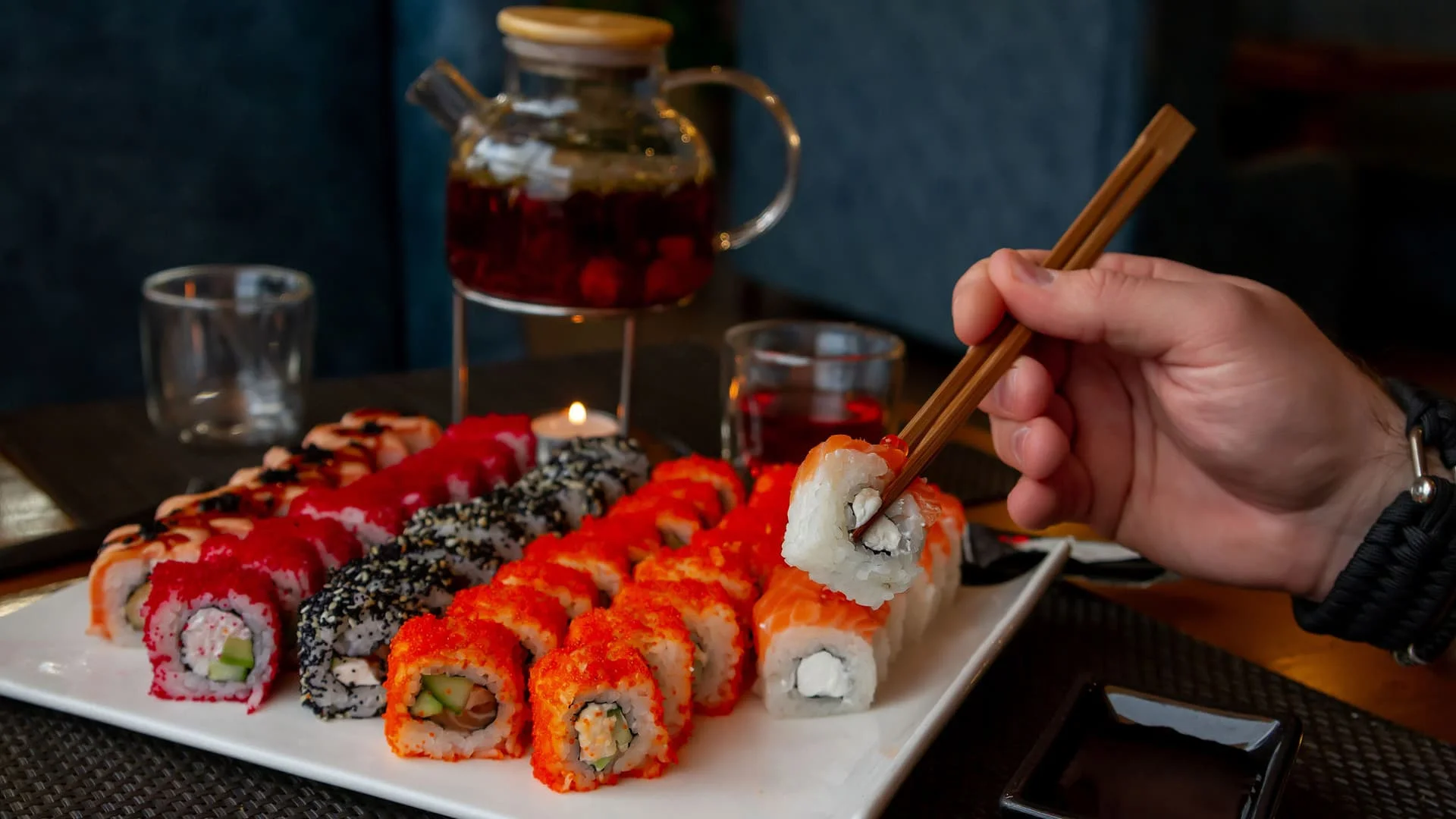 A beautifully arranged table with delicious dishes and drinks.