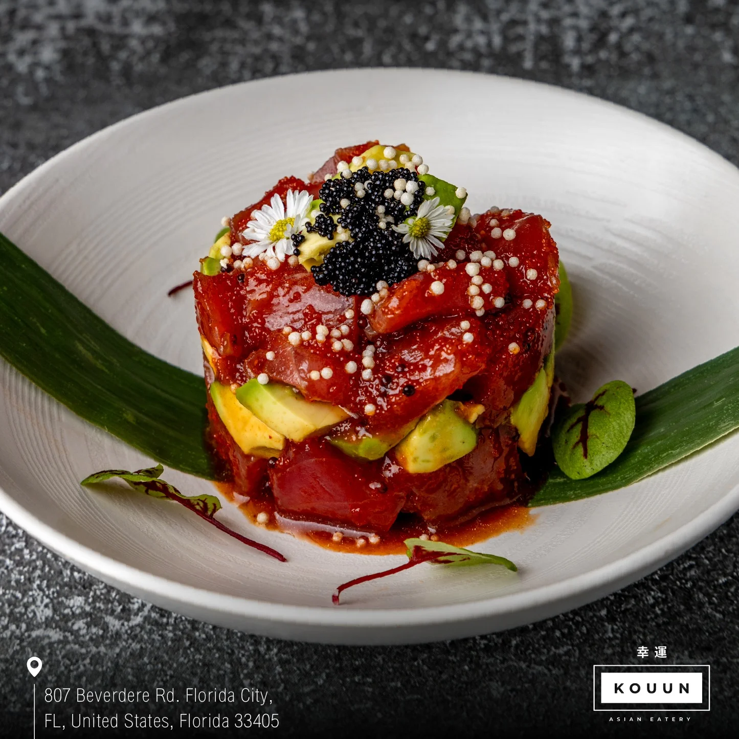 Tuna tartare with avocado and caviar, served in a modern Asian style