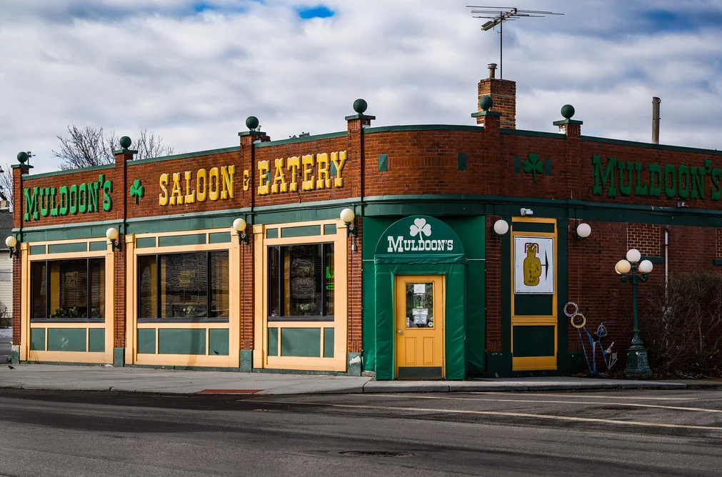Exterior view of Muldoon's Saloon & Eatery with vibrant signage