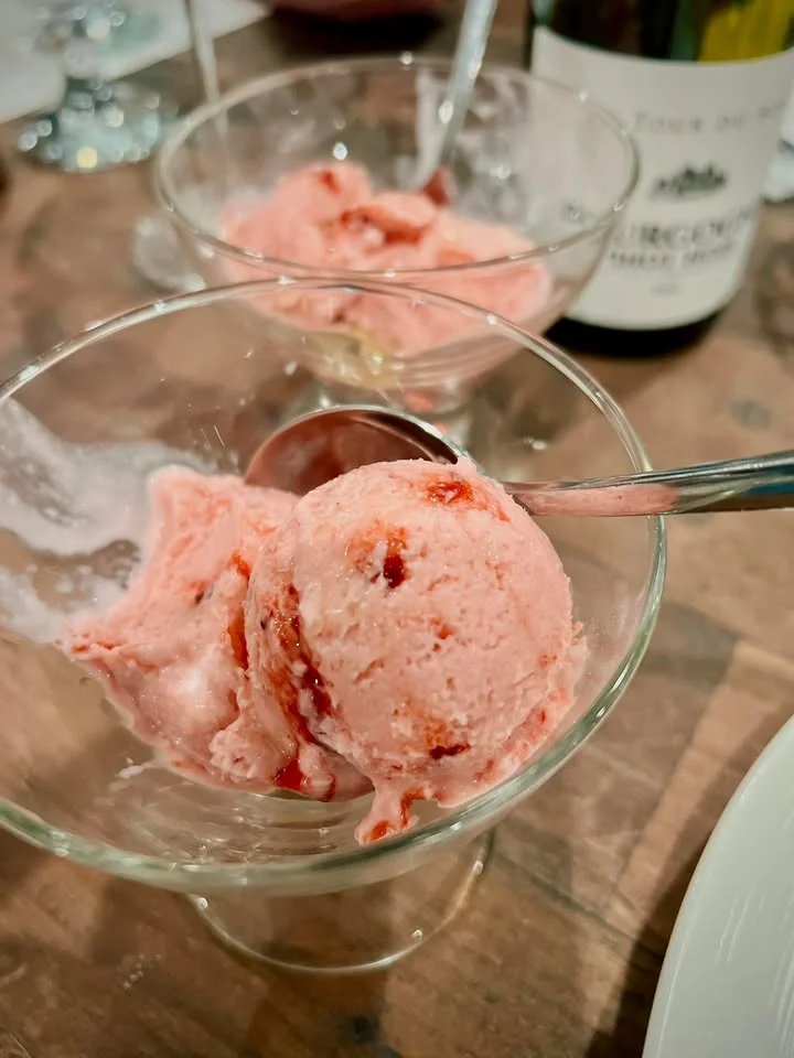 Strawberry sorbet served in a glass bowl