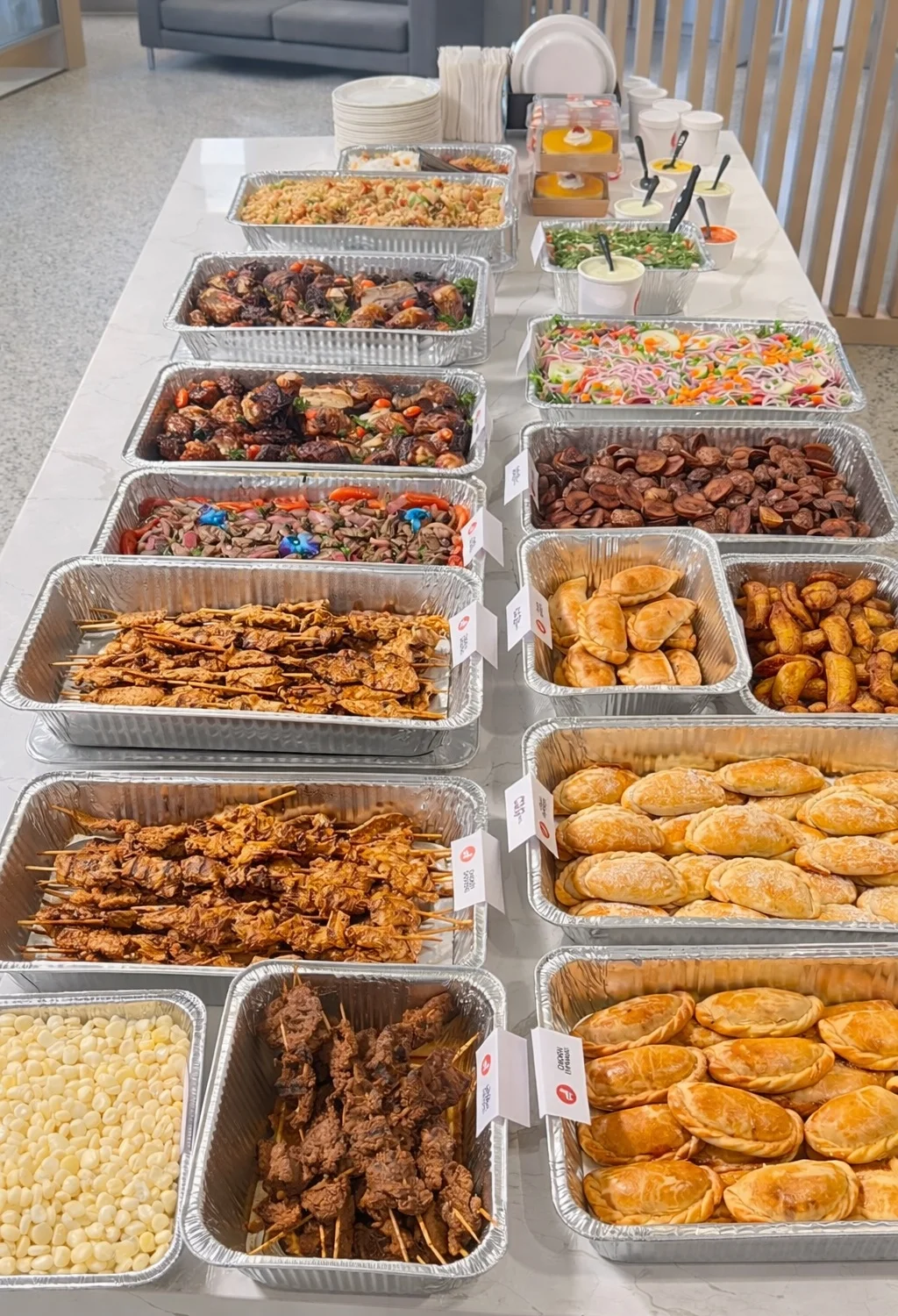 Assorted Asian appetizers including skewers and dumplings