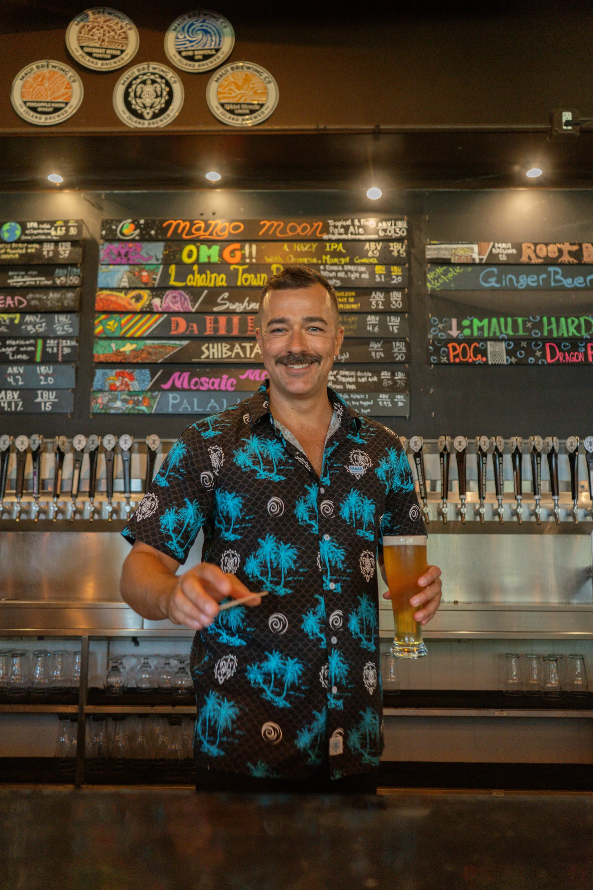 Bartender serving craft beer at a vibrant bar