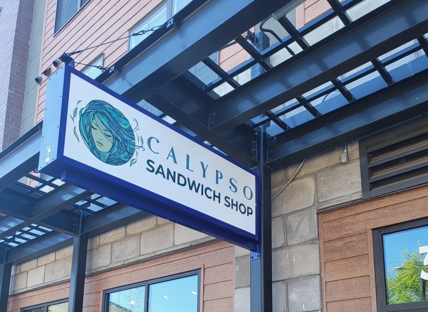 Exterior view of Calypso Sandwich Shop with outdoor seating