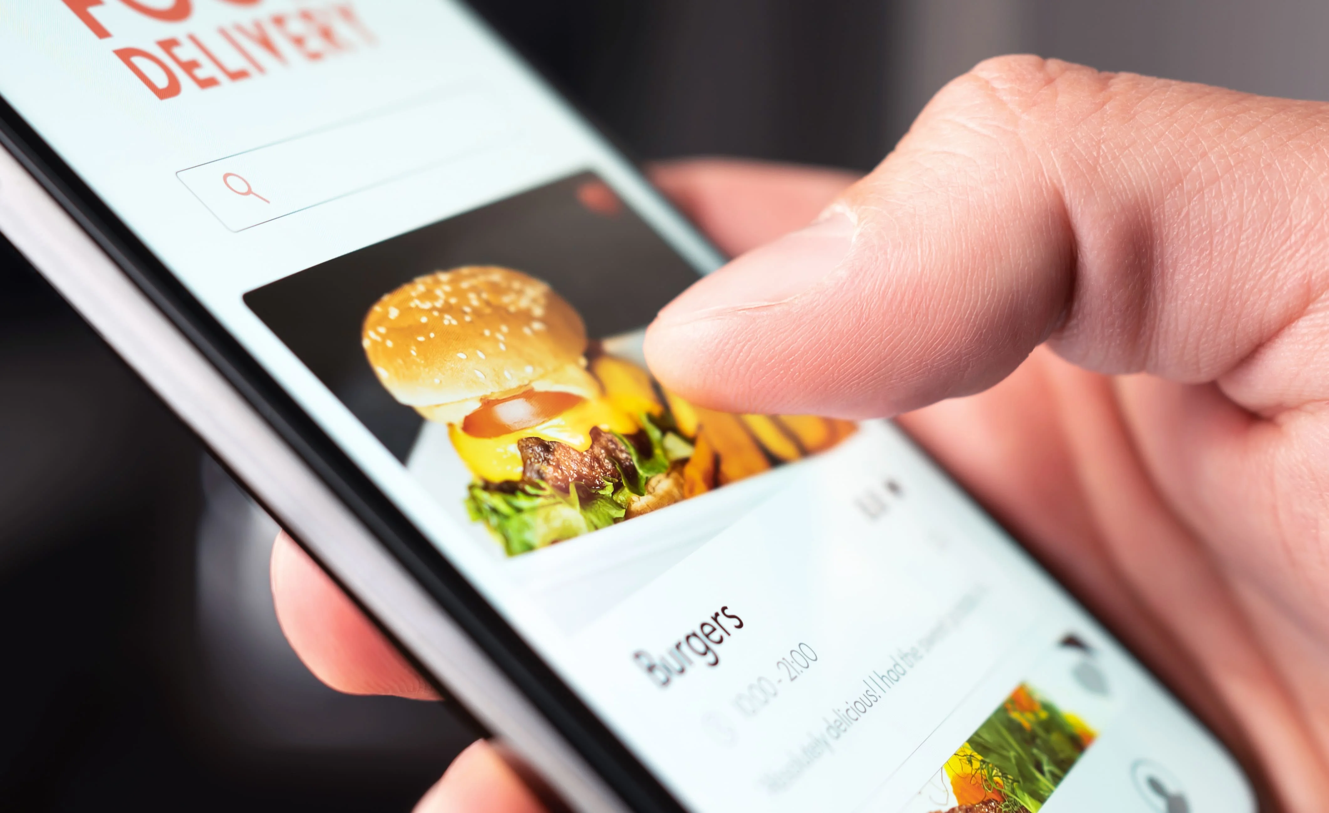 User browsing a food delivery app for burgers