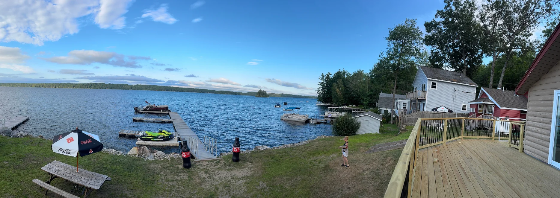 Scenic lakeside view with docks and boats