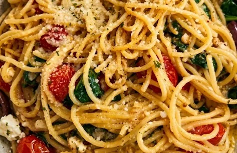 Spaghetti Aglio e Olio with cherry tomatoes and spinach
