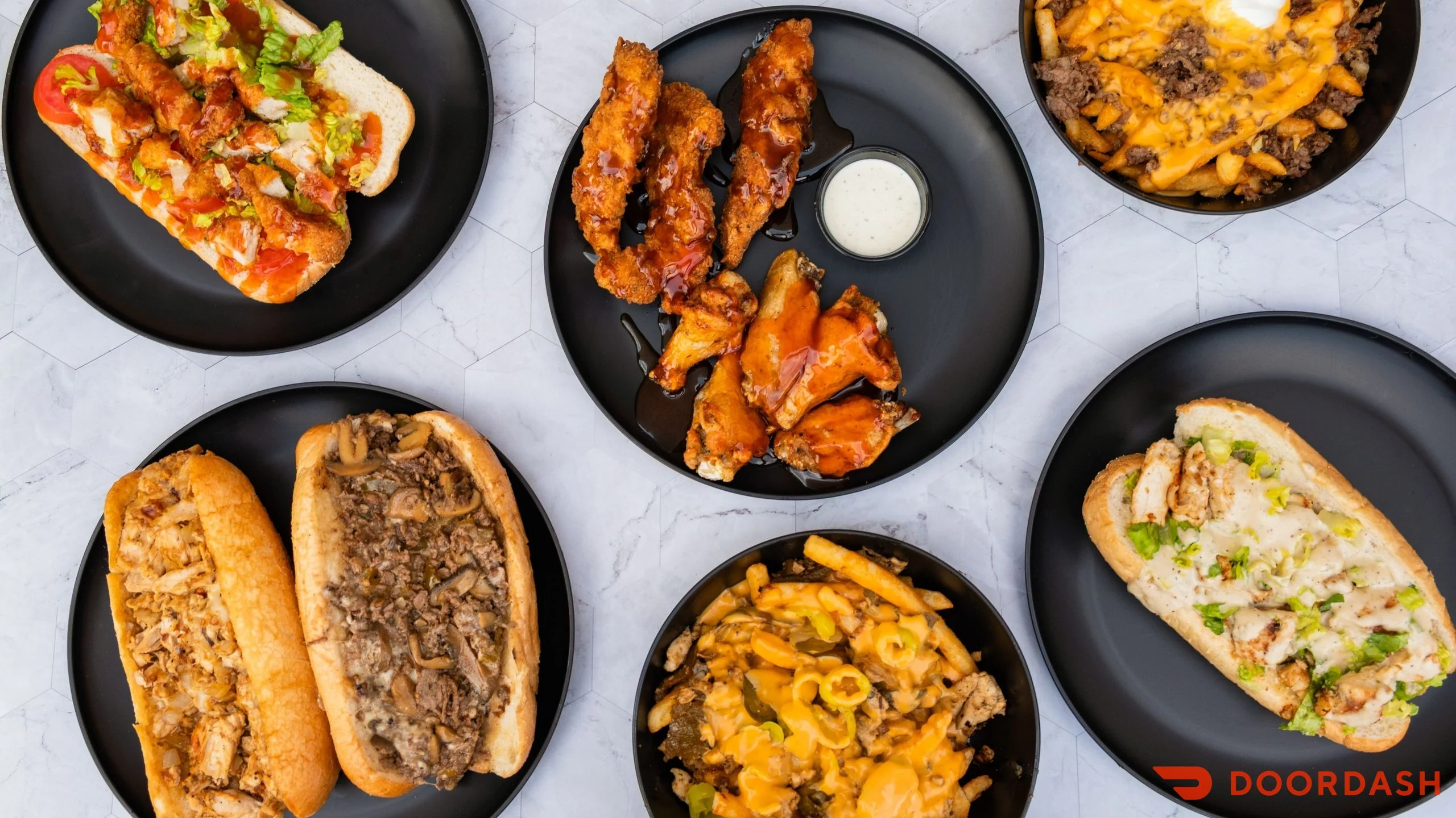 cheesesteaks, wings, tenders, and loaded fries