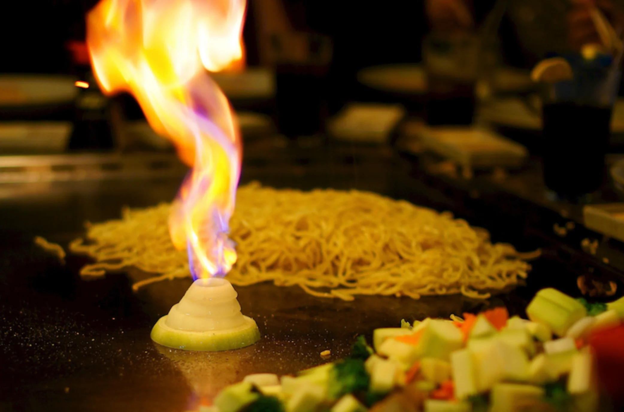 Flaming onion volcano at a Japanese teppanyaki grill