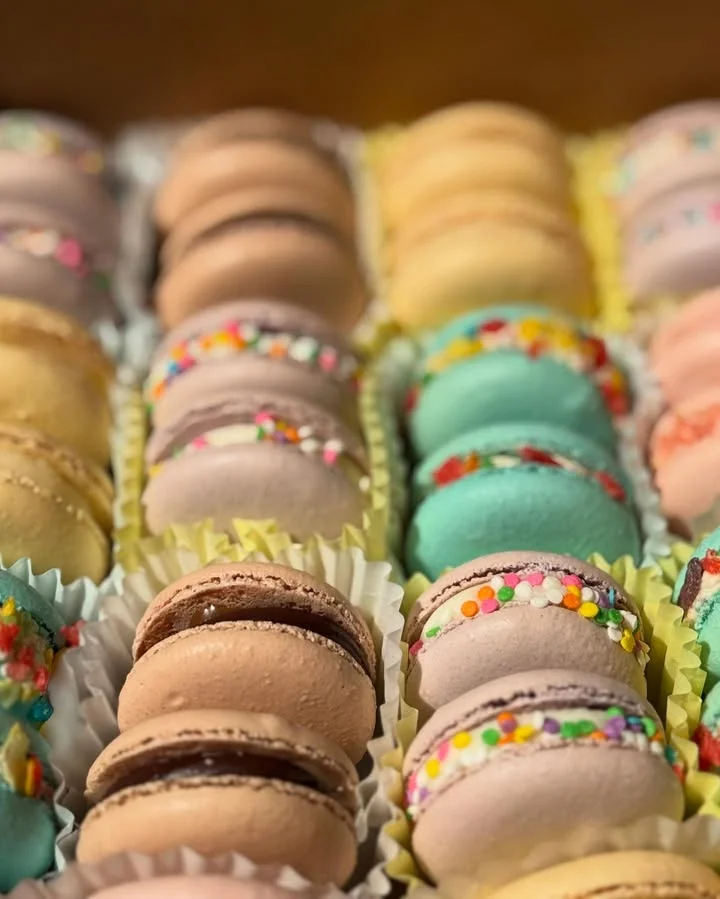 Colorful assortment of French macarons on display