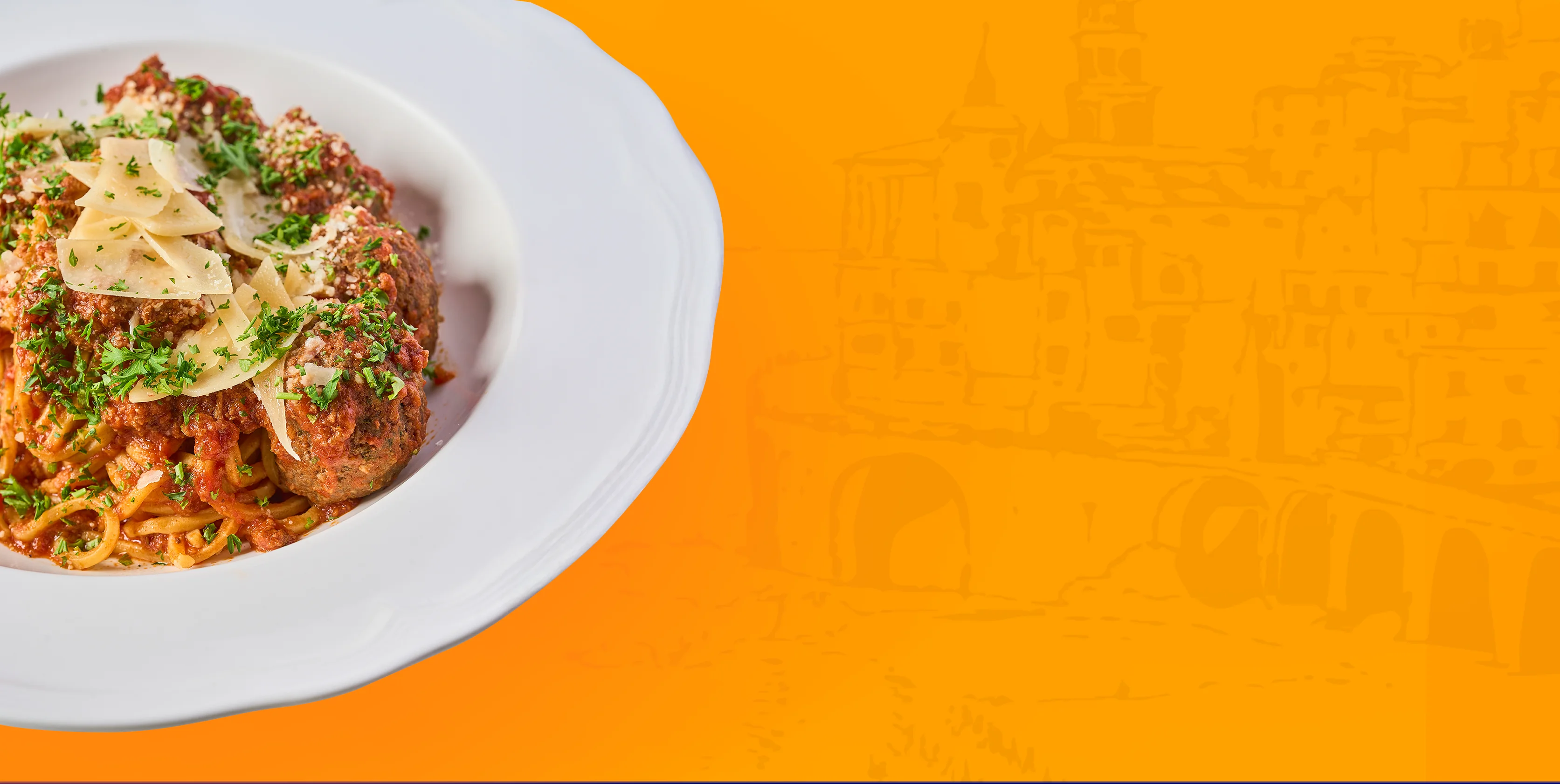 Classic spaghetti and meatballs served with fresh herbs and parmesan