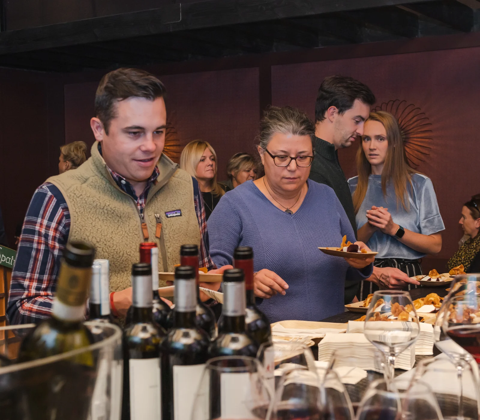 Guests enjoying a buffet in a cozy restaurant setting