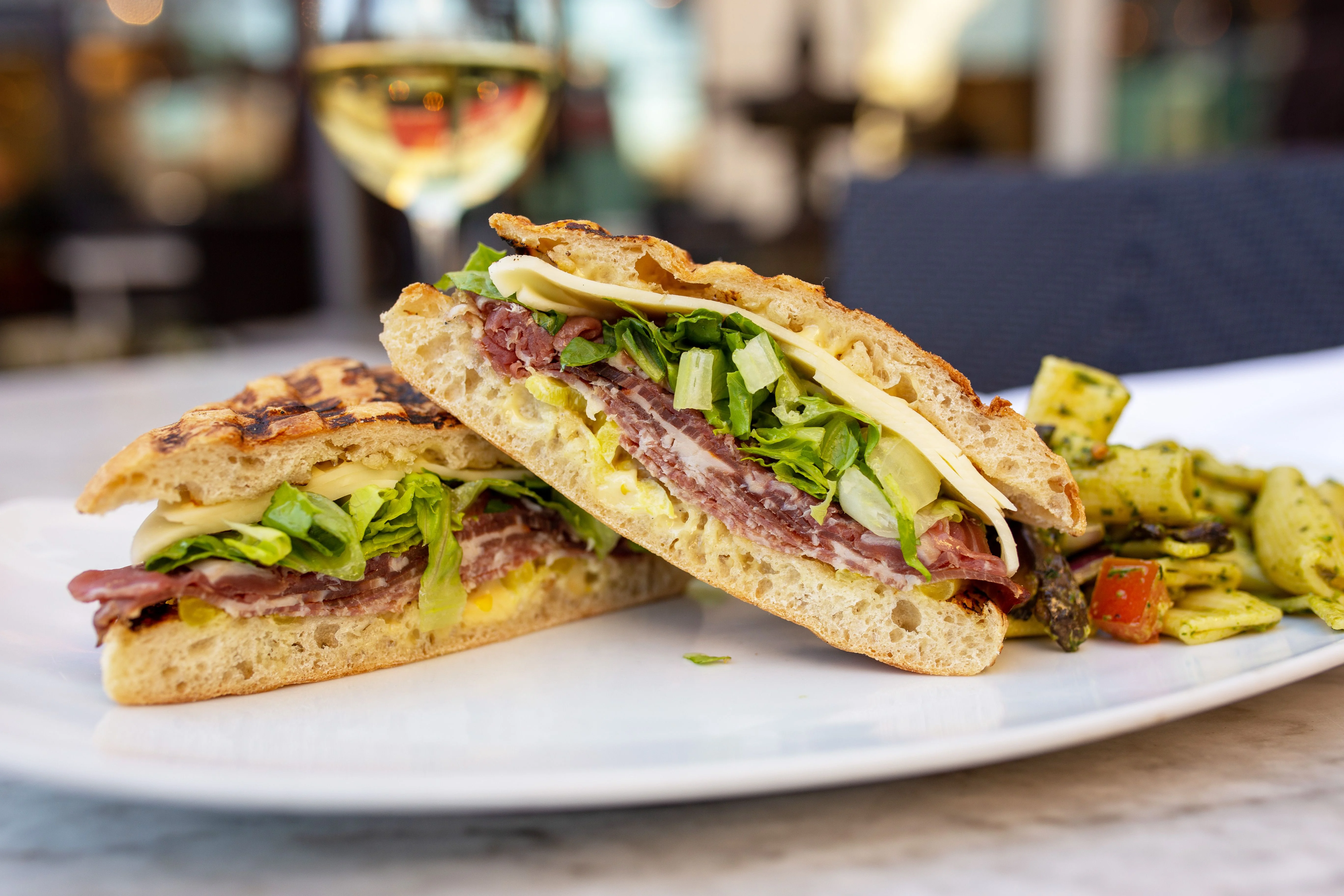 Italian panini sandwich with fresh greens
