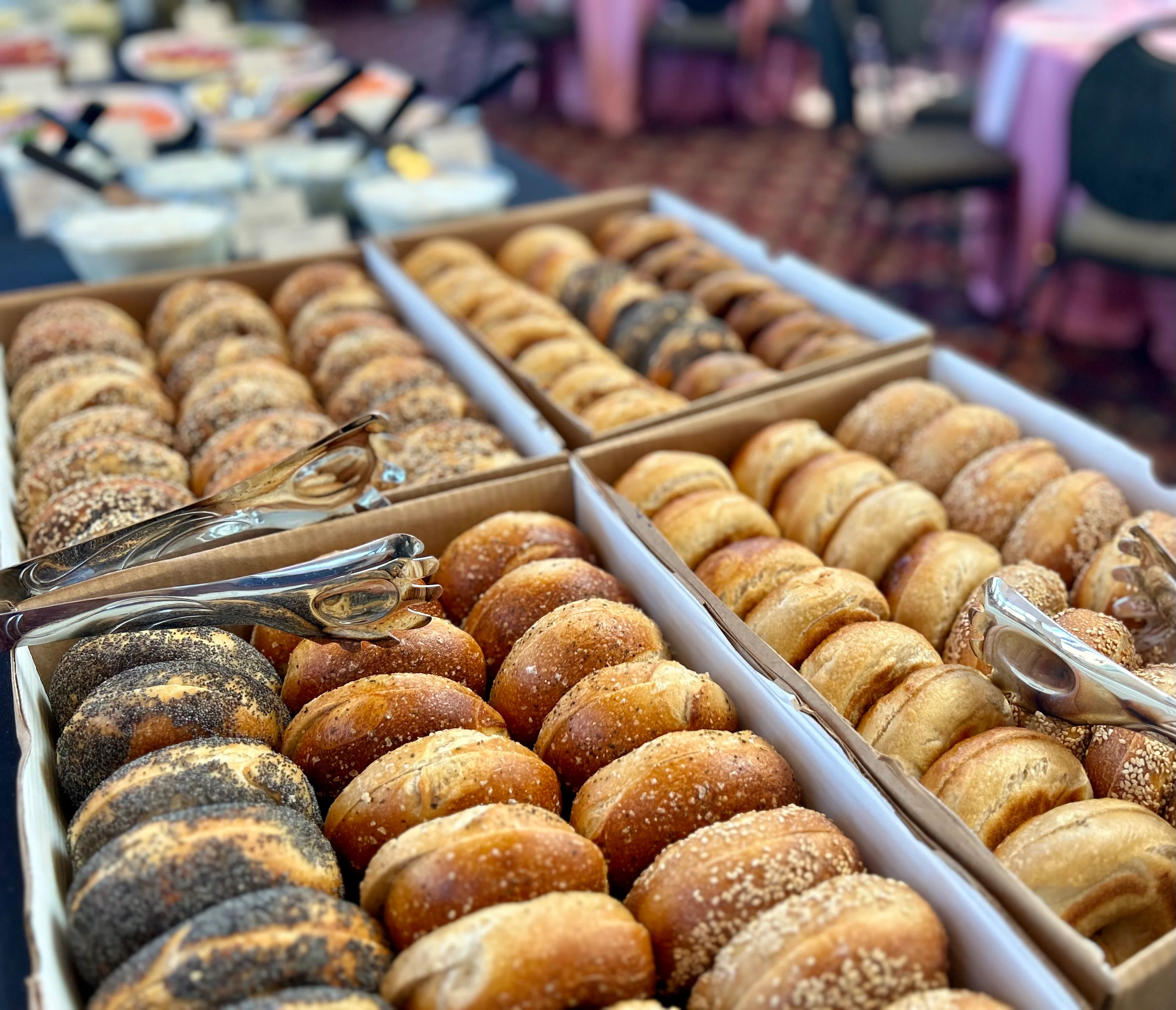 Assorted bagels on display at a brunch buffet