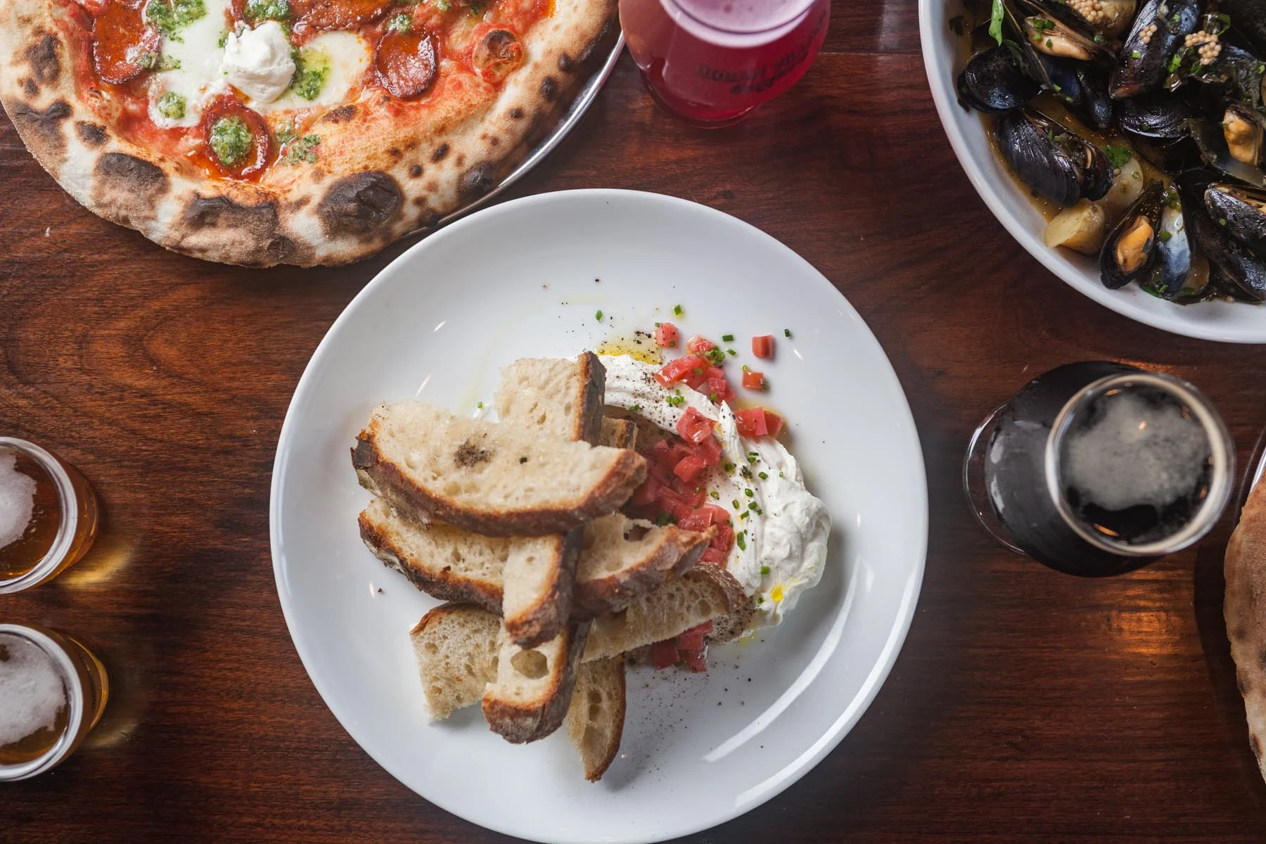Italian burrata with rustic bread and diced tomatoes