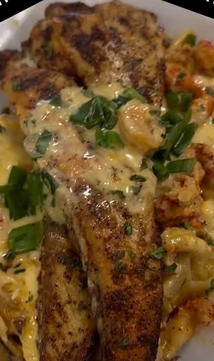 Southern blackened catfish with creamy sauce and shrimp