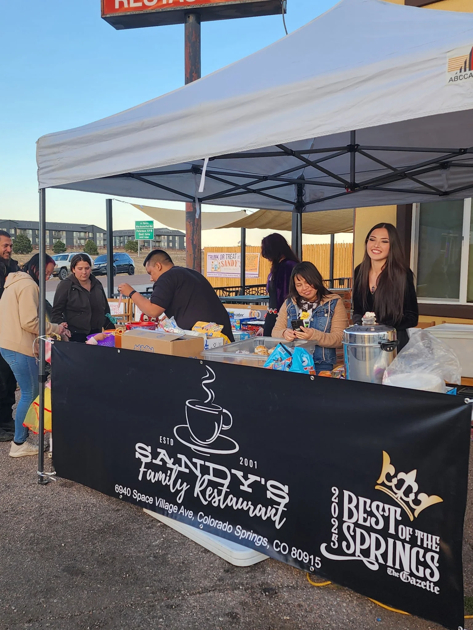 Community event at Sandy's Family Restaurant with festive atmosphere