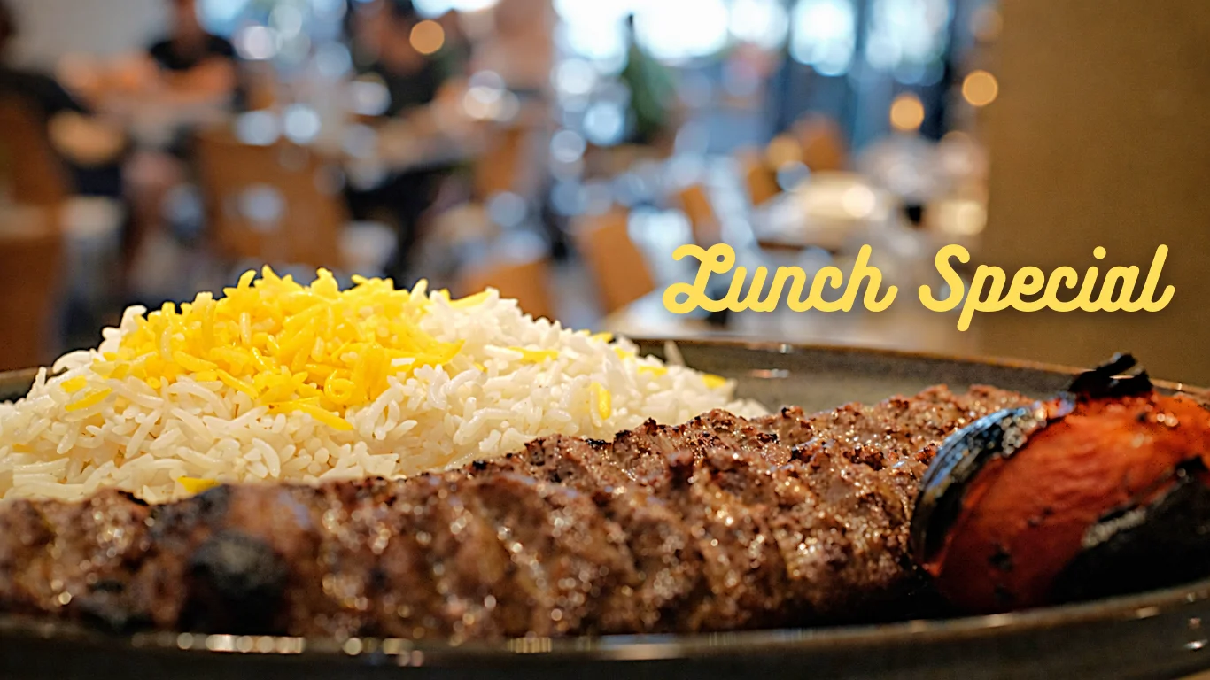 Persian kebab with saffron rice and grilled tomato