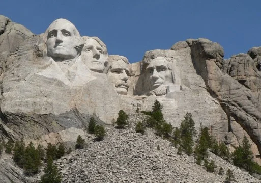 Mount Rushmore National Memorial featuring four presidential faces.