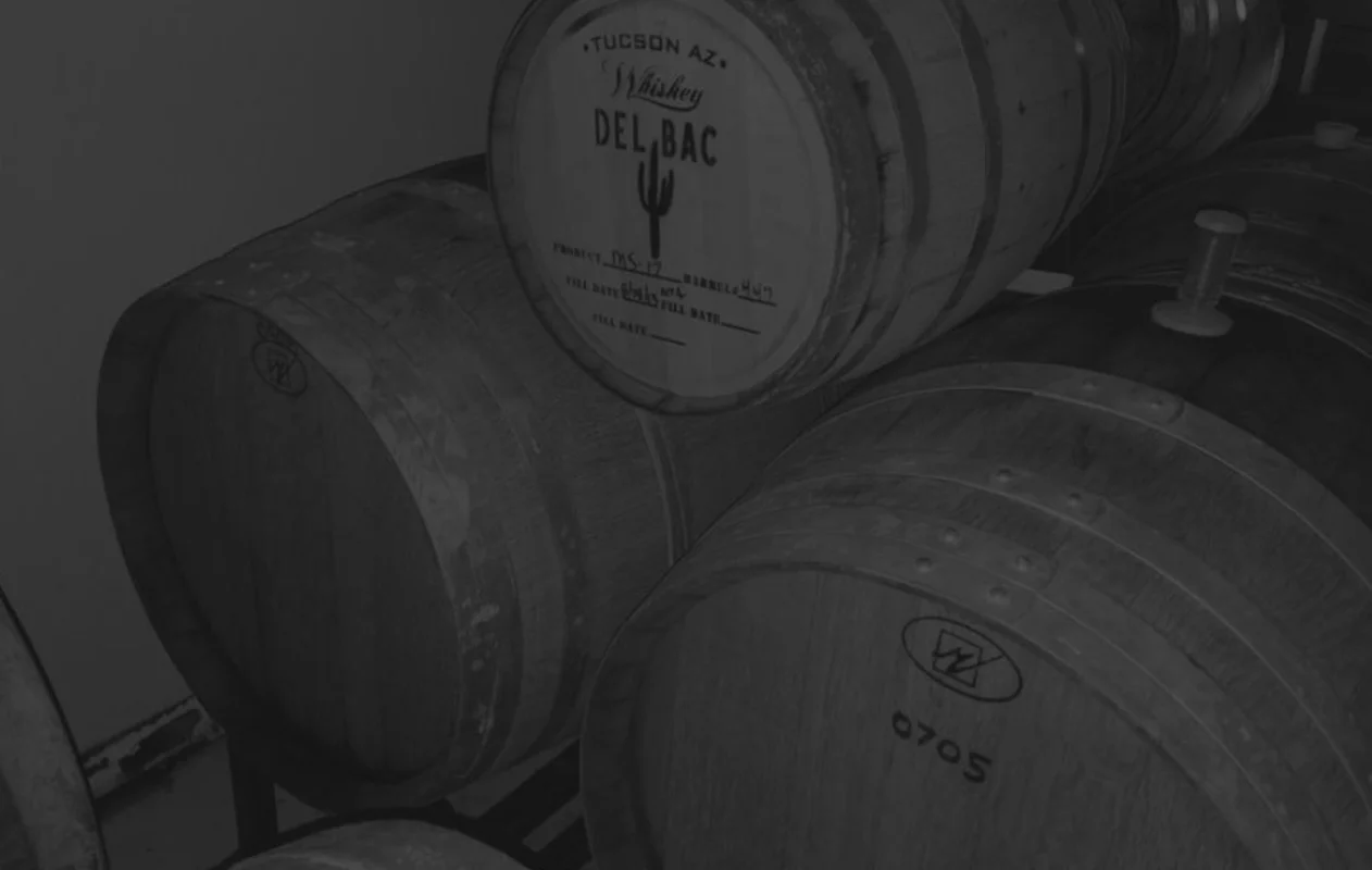 Whiskey barrels aging in a distillery