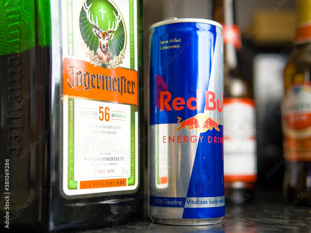 Bottles of Jägermeister and Red Bull on a bar counter