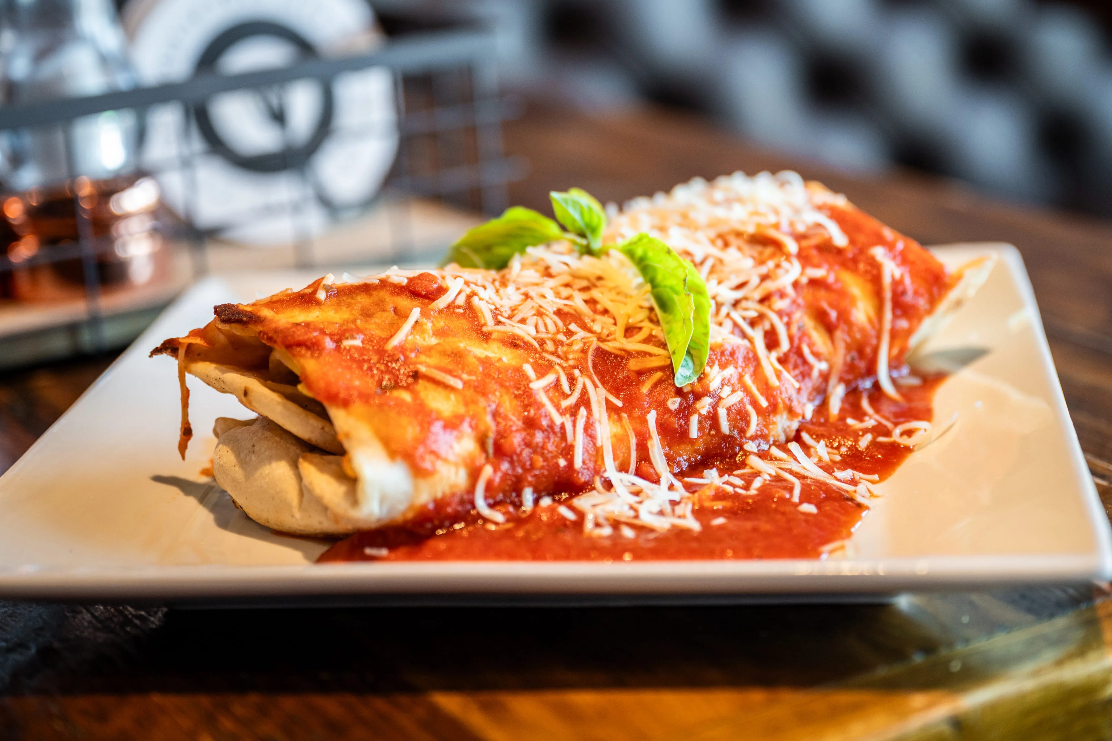 Delicious enchiladas topped with red sauce and cheese
