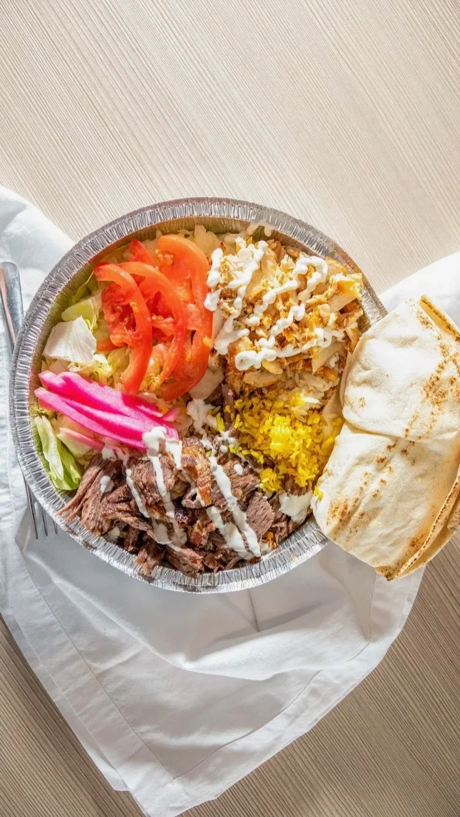 Mediterranean beef shawarma platter with rice and vegetables