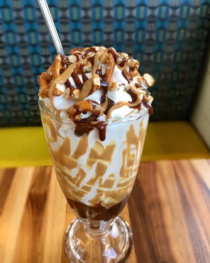 Decadent sundae with caramel and chocolate drizzle