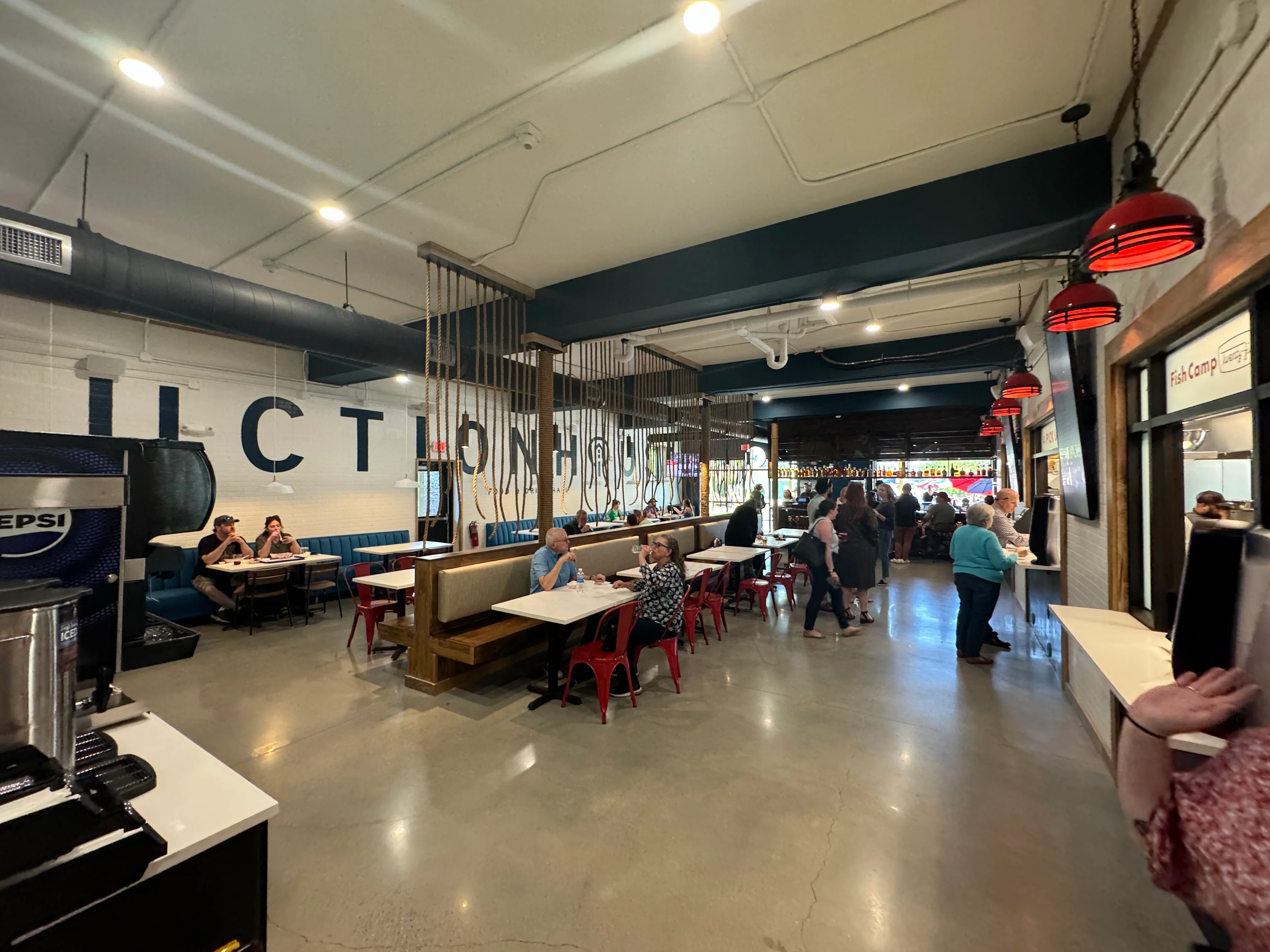 Modern restaurant interior with vibrant decor and seating areas