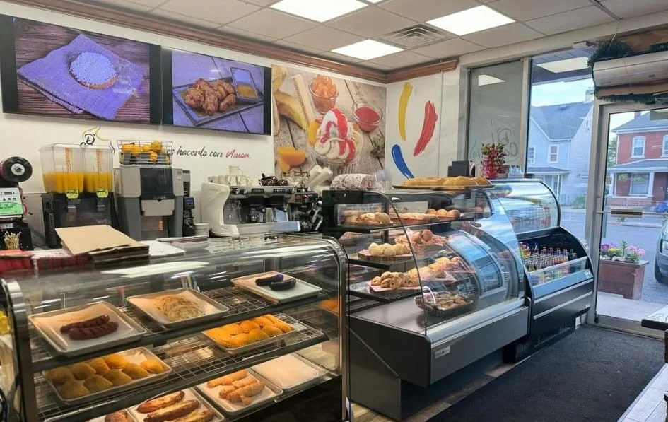 Cozy bakery interior with assorted pastries and drinks