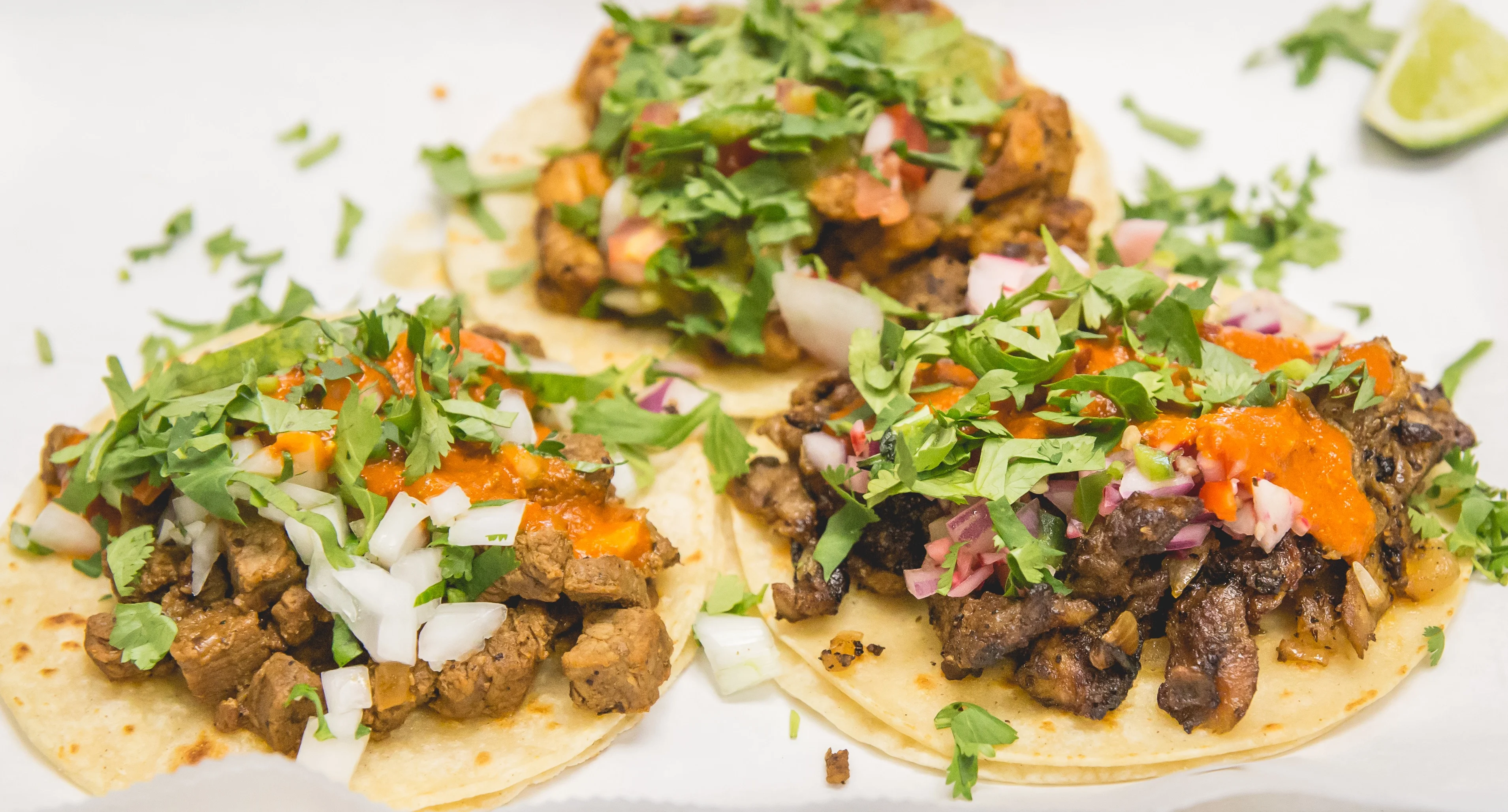 Authentic Mexican street tacos with cilantro and salsa