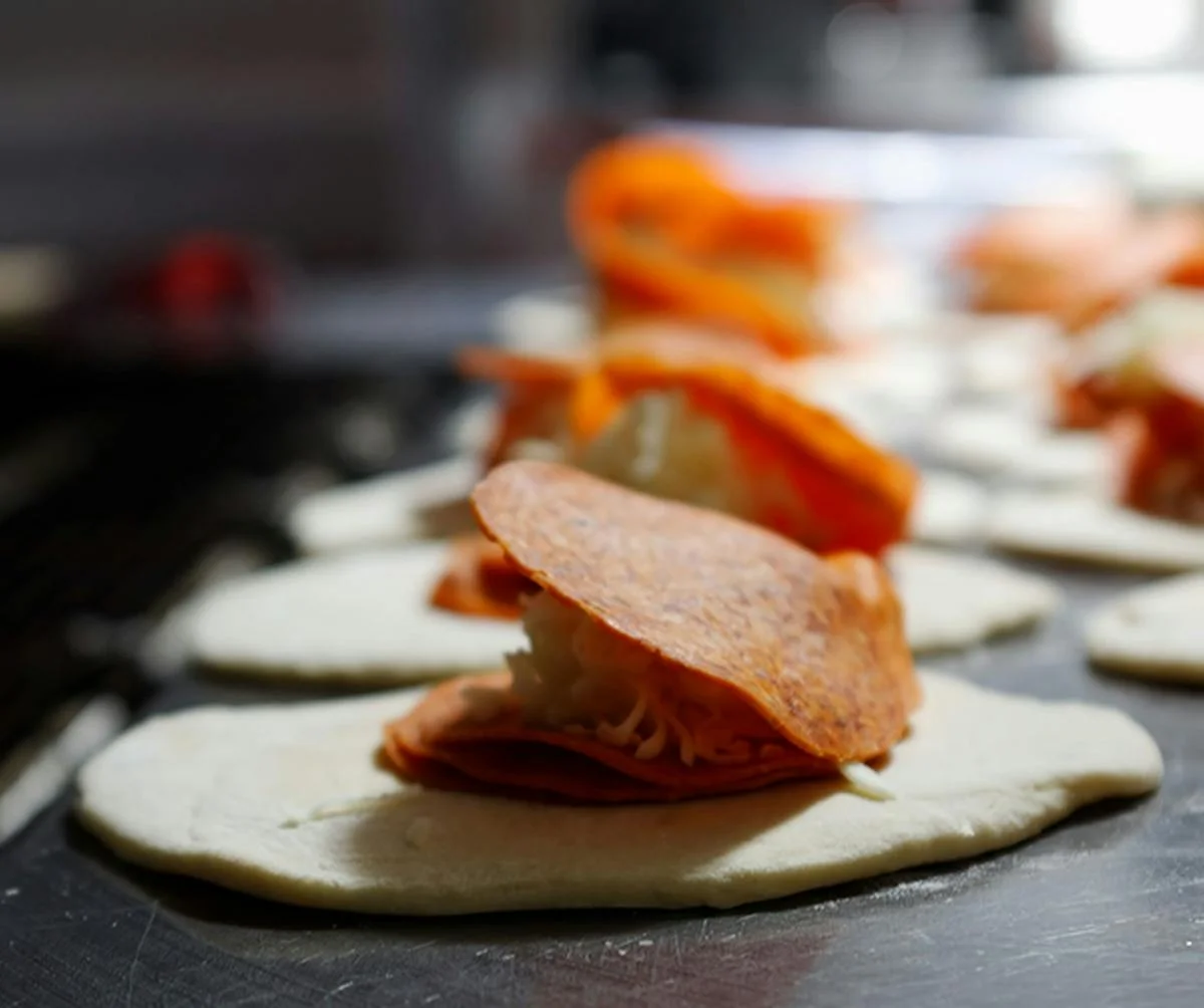 A restaurant chef preparing a dish