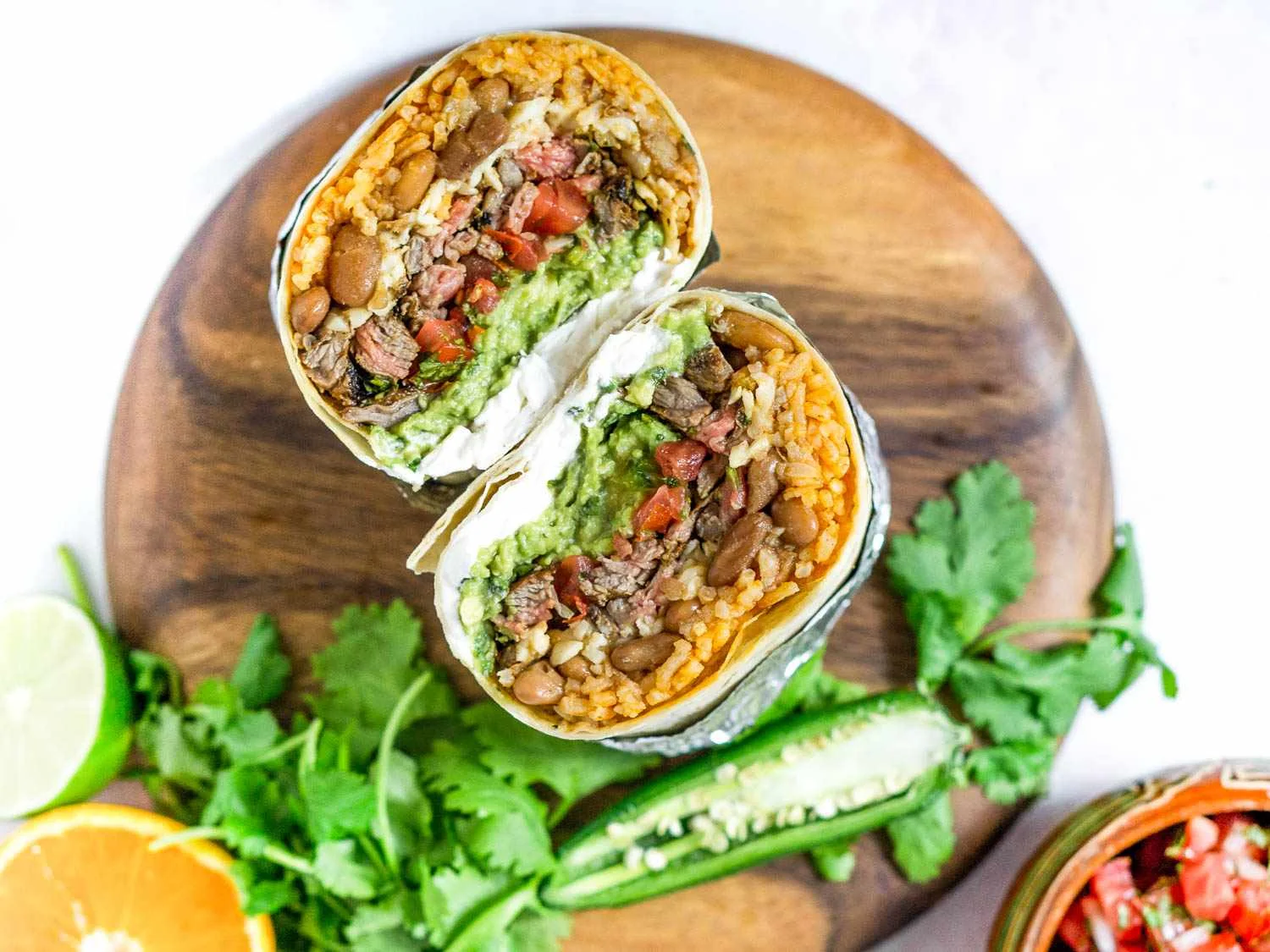 Delicious Mexican burrito filled with rice and beans