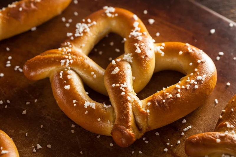 Freshly baked soft pretzel with coarse salt